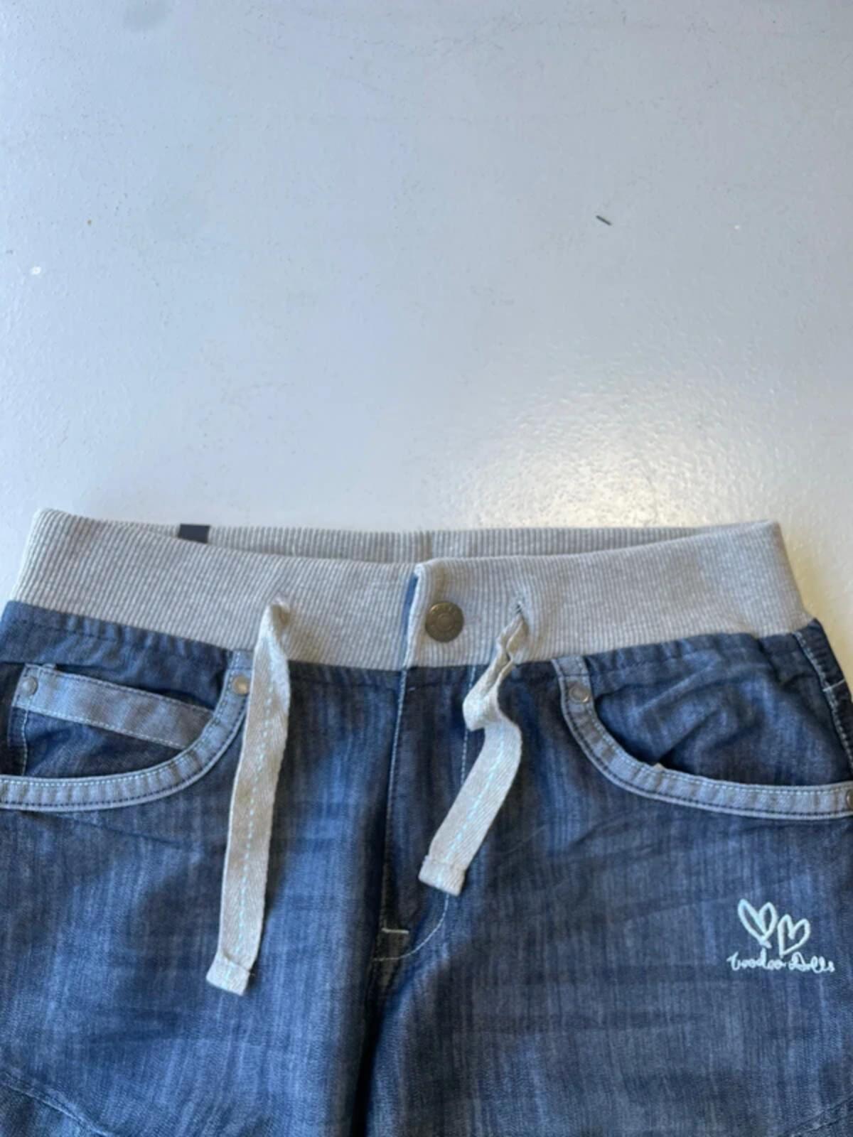 Y2K navy low rise jeans with grey ribbed waistband