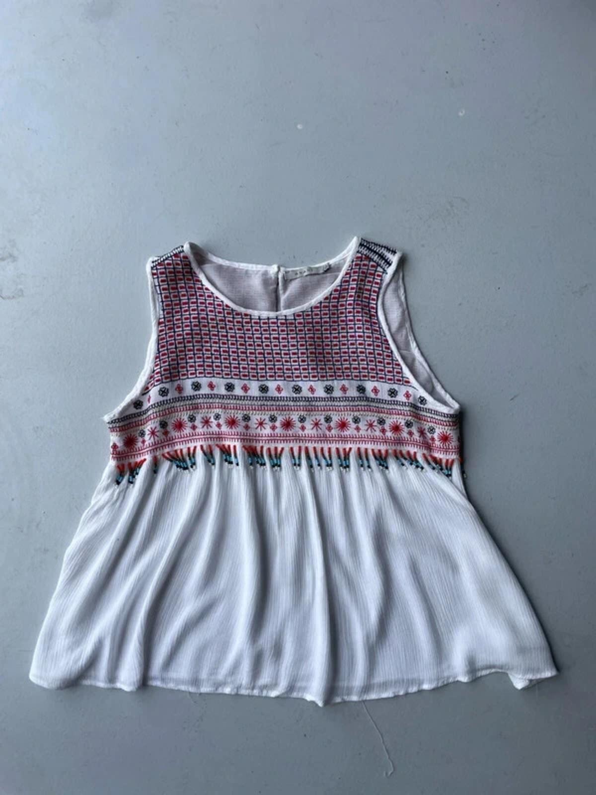 White cami with red embroidery and beading