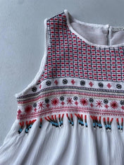 White cami with red embroidery and beading