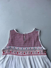 White cami with red embroidery and beading
