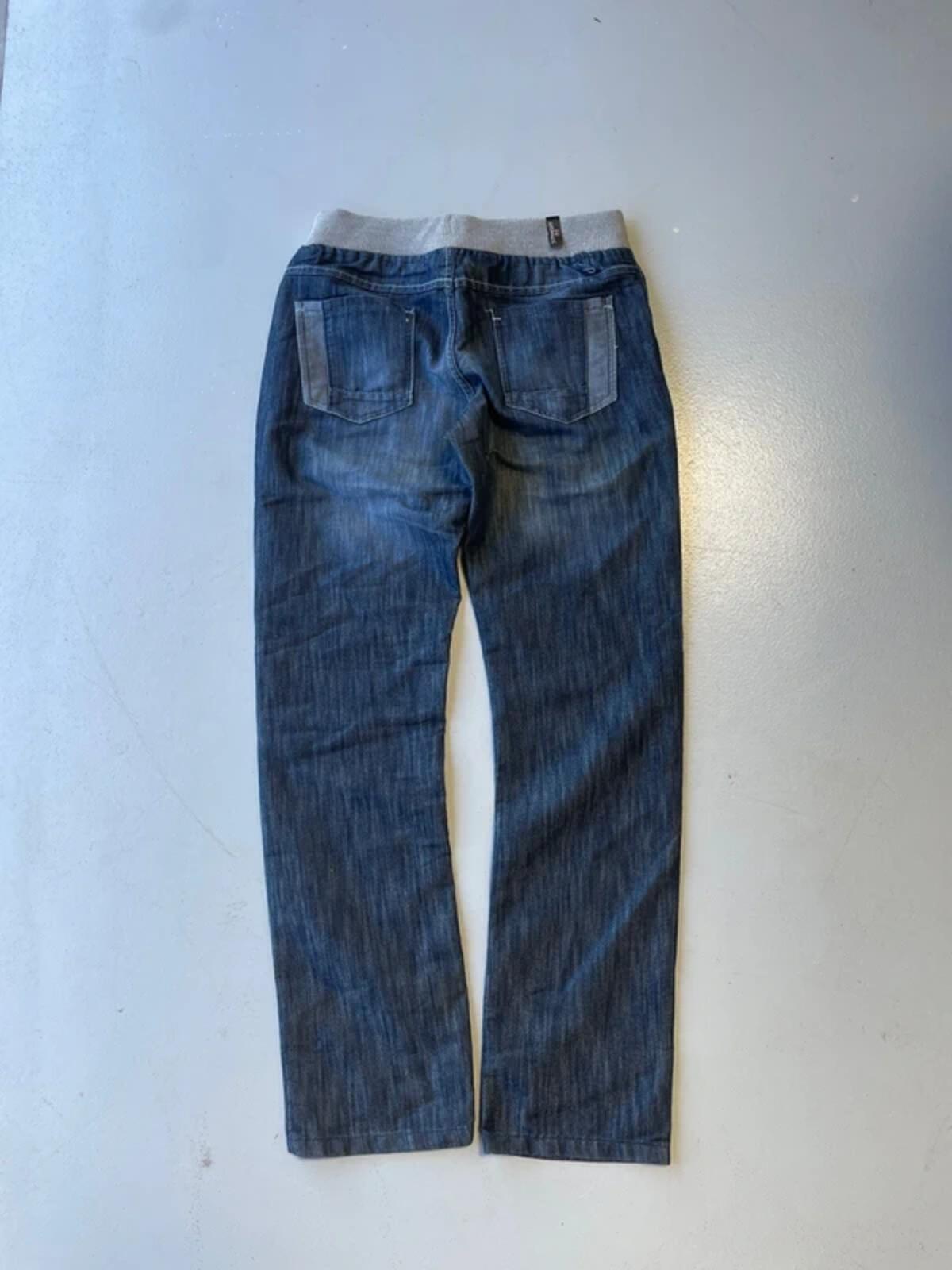 Y2K navy low rise jeans with grey ribbed waistband